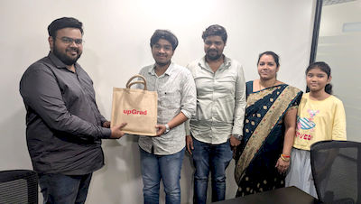 upGrad Mumbai office - student and parents with the counselling team after their study abroad session